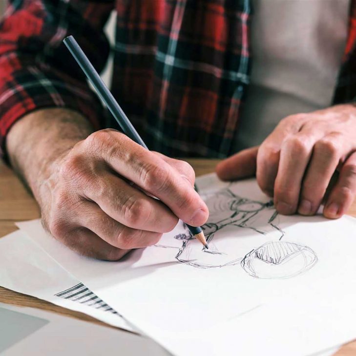 Topiary artist preparing a sketch